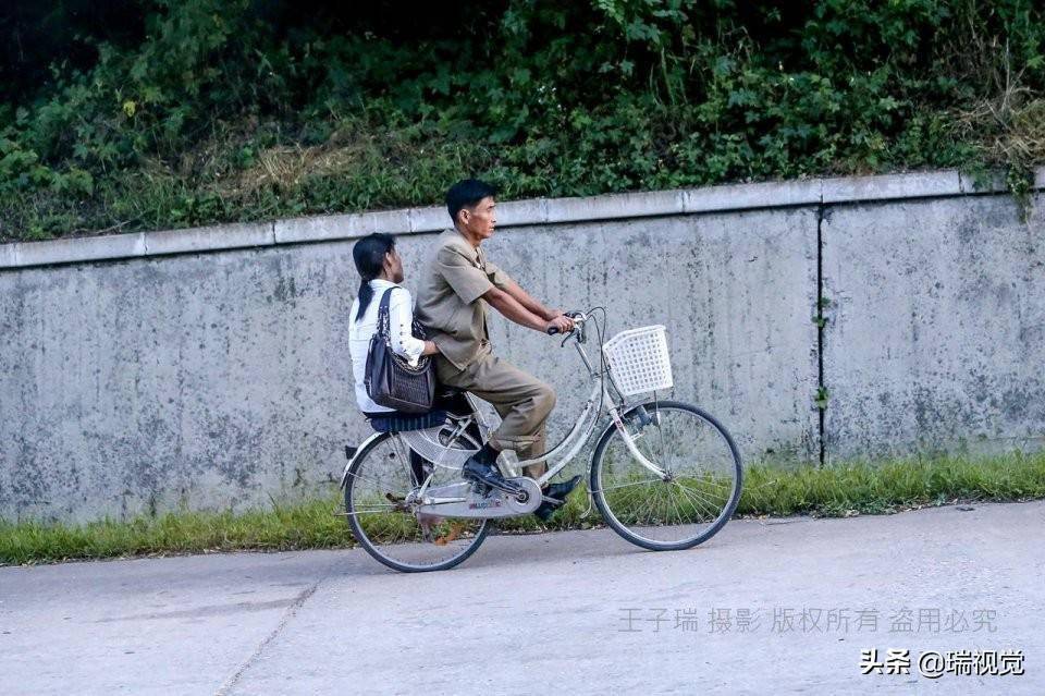 自行车双人骑_双人自行车_自行车双人雨衣